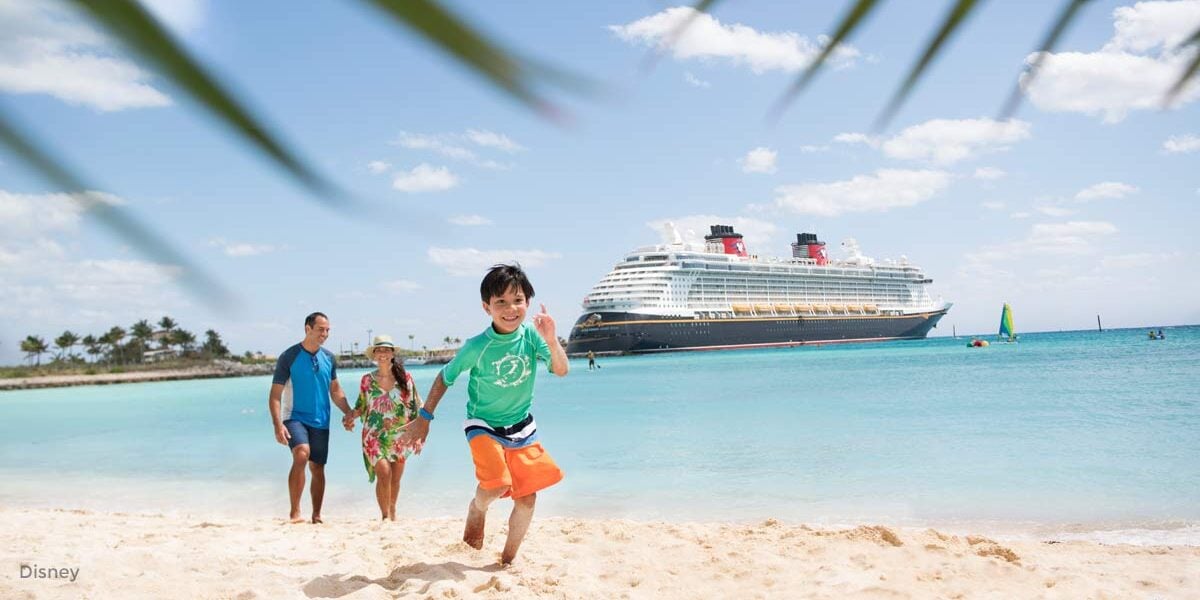 A cheerful kid races along a beach with relatives as a cruise ship, ready for onboard adventures, gleams on the turquoise sea.