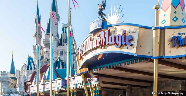 Mickey’s PhilharMagic entrance with Cinderella Castle behind, a perfect Disney World spot to chill in cool AC during your visit.