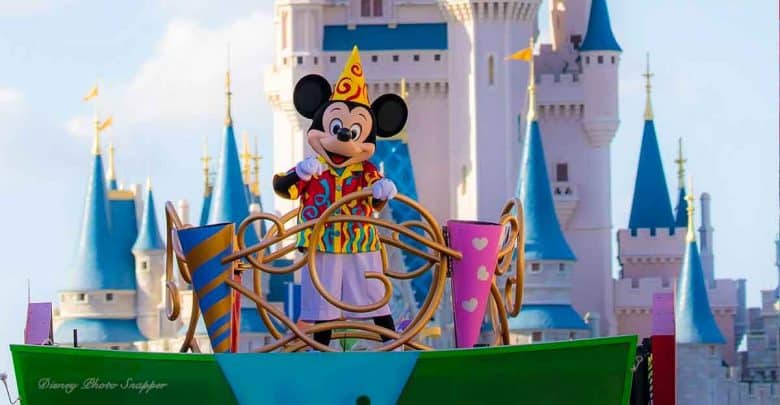 Mickey Mouse waves enthusiastically from a vibrant parade float, set against Cinderella Castle at Disney World.
