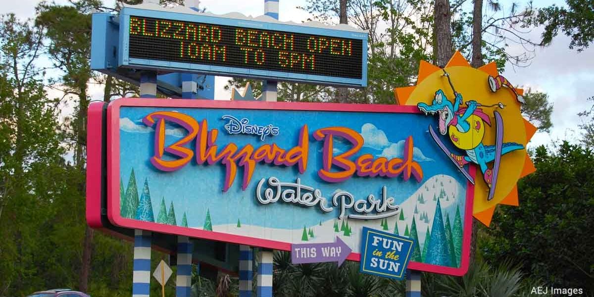 Disney Water Parks sign with animated character, announcing “Blizzard Beach Open Today to Stay”—a splash-filled adventure awaits!.