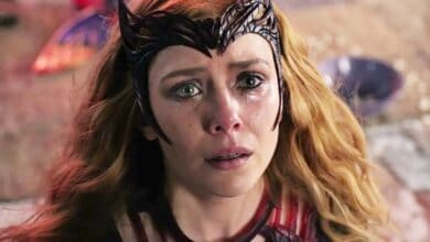 Daisy ridley as Rey from Star Wars, emotional moment, cinematic shot with colorful background.