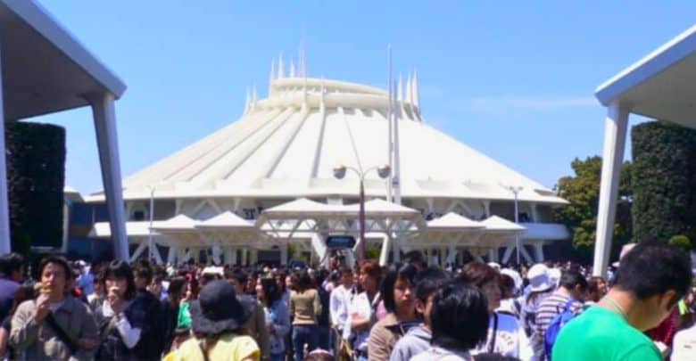 Crowds gather around Space Mountain at Tokyo Disneyland