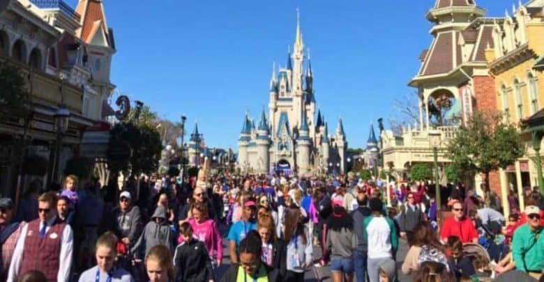 Crowds on Main Street U.S.A. at Disney World with Cinderella Castle in the background