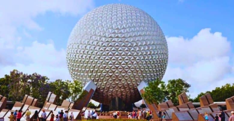 Guests in front of Spaceship Earth inside of EPCOT at Walt Disney World Resort