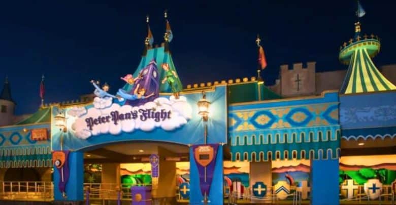 The exterior of Peter Pan's Flight lights up at night