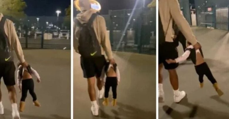 A sequence of three images showing a person walking outside at night, holding a small child by the hand. The child is dressed in a pink jacket, black pants, and yellow shoes. The adult wears a hoodie, shorts, and carries a backpack.