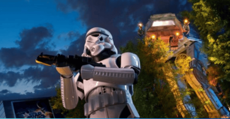 Stormtrooper wields a gun outside Star Tours