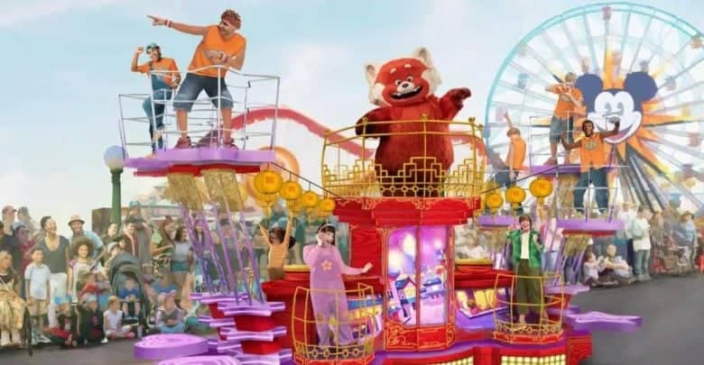 A vibrant parade float featuring a large red panda character surrounded by performers in orange outfits. The float moves through a crowded amusement park, with a Ferris wheel and roller coaster in the background. Spectators line the street, enjoying the event.