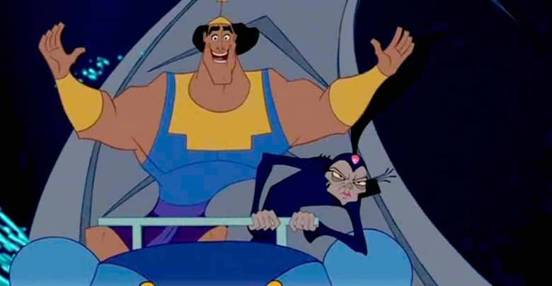 A muscular man in blue and yellow armor joyfully raises his arms while sitting in a cart next to a thin woman in black with a tall headpiece, who looks annoyed. Both characters appear animated and are in motion.