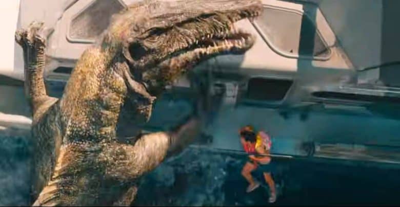 A giant dinosaur-like aquatic creature lunges out of the water toward a terrified person in a colorful shirt hanging from a ledge on a futuristic metal structure.