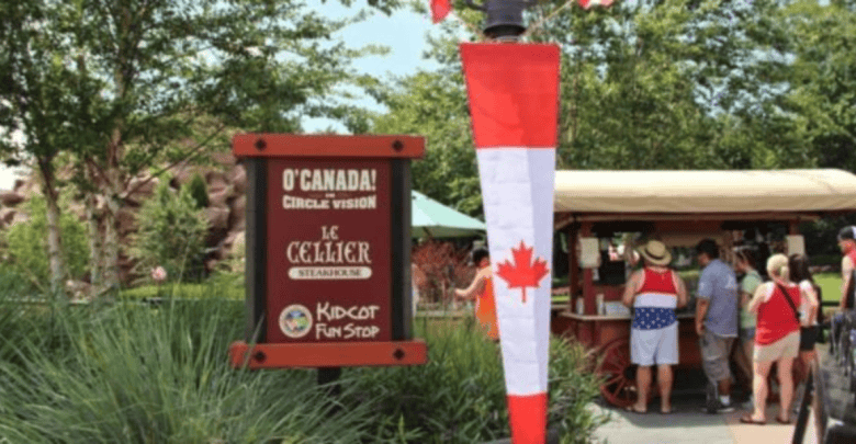 Canadians and other guests celebrating Canada Day at the EPCOT World Showcase Canada Pavilion at Walt Disney World Resort.