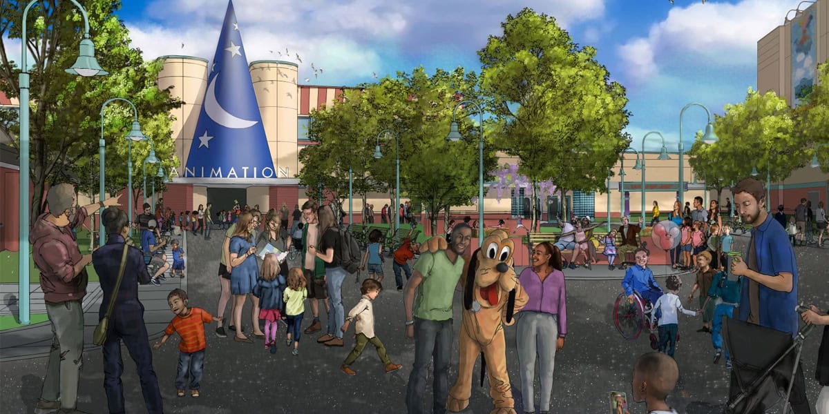 A lively theme park scene with families, children, and a person in a Pluto costume. Trees, lampposts, and a building with a large blue wizard hat labeled “ANIMATION” are in the background under a partly cloudy sky.