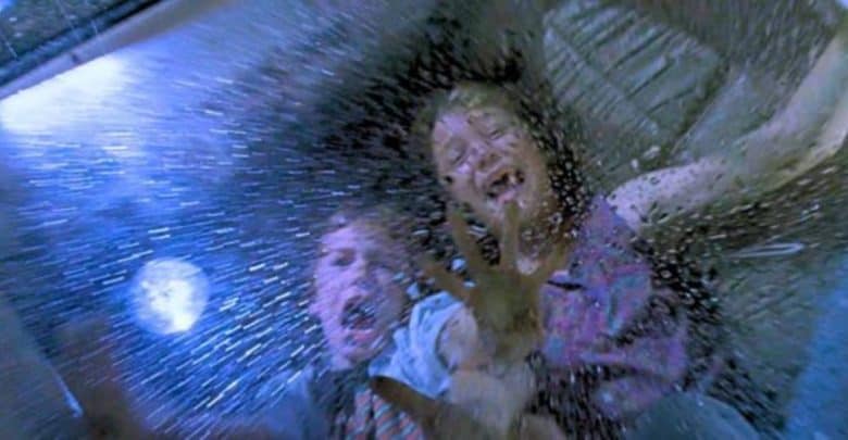 Lex and Tim behind the glass during the T-Rex attack in 'Jurassic Park'