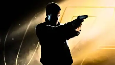 A silhouette of a man in a suit aims a handgun to the right, standing against a dramatic background with gold and black tones and the faint outline of the 007 logo.