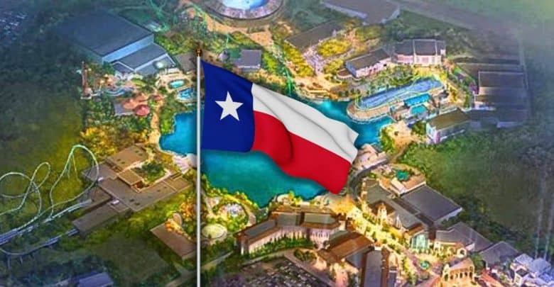 An illustrated aerial view of a theme park at night, brightly lit with various buildings and rides, with a large Texas state flag prominently displayed in the center.