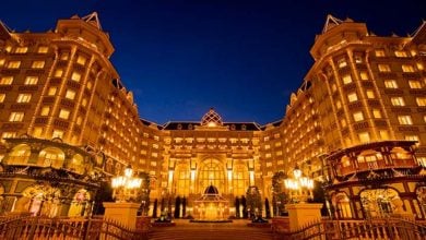 Tokyo Disneyland Hotel exterior lit up at nighttime