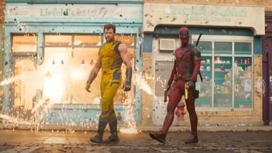 Wolverine and Deadpool walking into battle