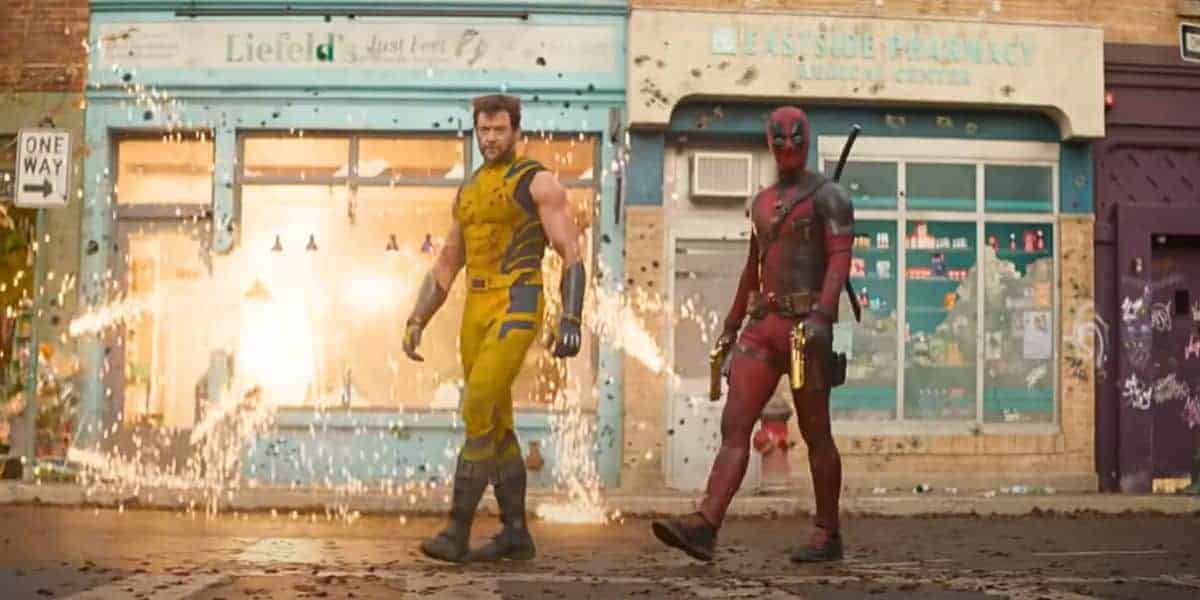 Wolverine and Deadpool walking into battle