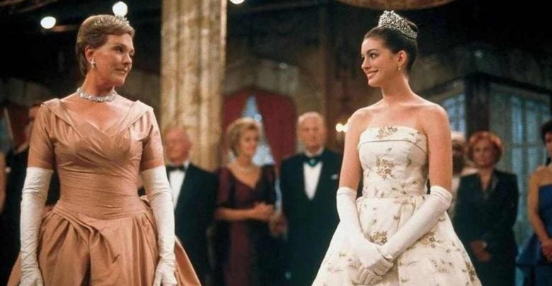 Princesses in sparkling gowns greet each other at a royal Disney ball, with guests in elegant attire mingling around them.