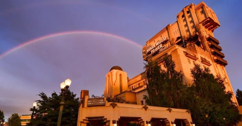 A vibrant rainbow arcs above Disney's Tower of Terror
