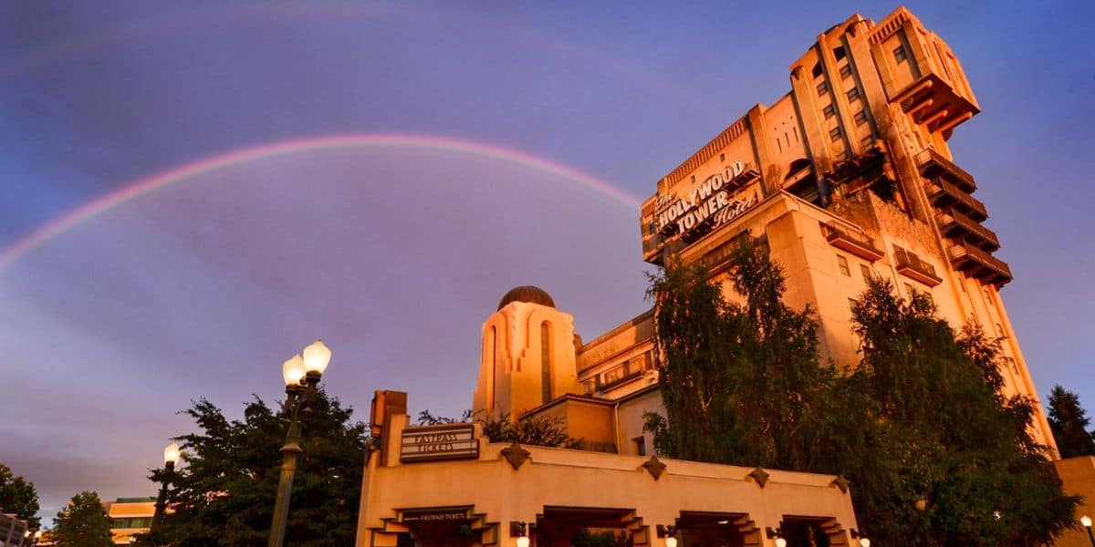A vibrant rainbow arcs above Disney's Tower of Terror