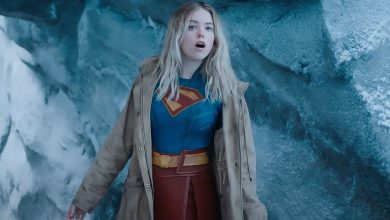 Supergirl with a coat over her costume