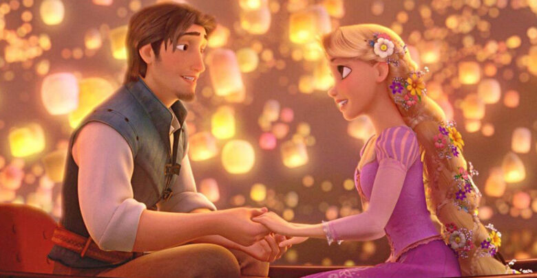 Rapunzel and Flynn Rider holding hands in a lantern-lit boat on the Tangled float during the Disney nighttime parade.