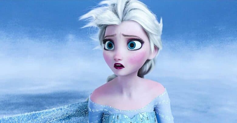 Elsa, with her signature pale skin and white hair, appears surprised as she stands in a frosty, snow-covered Arendelle—an eye-catching moment that’s sure to capture the attention of Disney Parks visitors debating the latest Frozen casting news.
