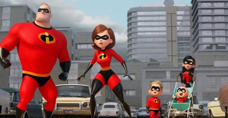 The Incredibles, dressed in their iconic red suits, stand poised for action on a vibrant city street—an energetic tableau that captures the thrilling spirit guests love at Pixar-themed lands and leaves everyone buzzing about the possibility of Incredibles 3 coming to life in parks and beyond.