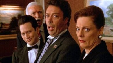 Four guests dressed in their best evening attire stand together in a themed Disney resort lounge, their faces full of shock and intrigue, as if they’ve just uncovered the surprise behind a secret Imagineering door or stumbled into a mystery straight out of an interactive Disney live show.