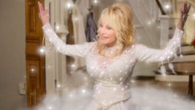 Dolly Parton in silver dress in 'Christmas on the Square'