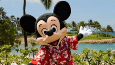 Mickey Mouse in a red floral shirt at Aulani, A Disney Resort & Spa.