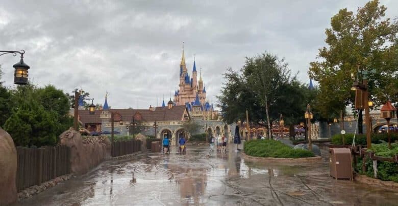 Cinderella Castle at Magic Kingdom under a cloudy Florida sky.