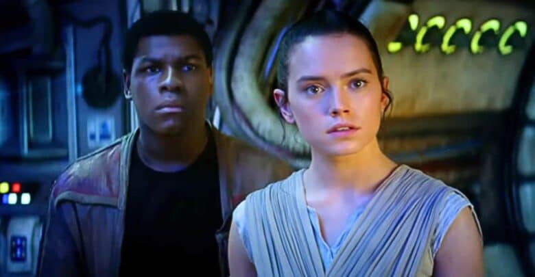 Finn and Rey in the Millennium Falcon cockpit at Star Wars: Galaxy’s Edge.