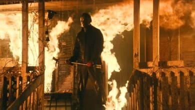 Michael Myers at the burning house from the 1978 film Halloween.