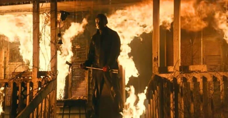 Michael Myers at the burning house from the 1978 film Halloween.