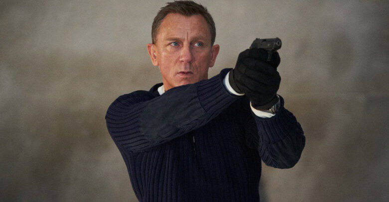 James Bond as 007 aiming his handgun.