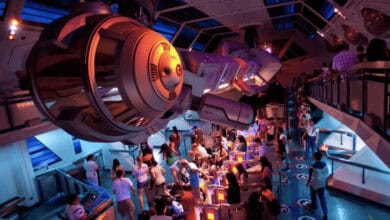 Guests in the Space Mountain boarding area at Disneyland.