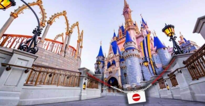 Cinderella Castle at Magic Kingdom behind a closed gate during a Walt Disney World closure.