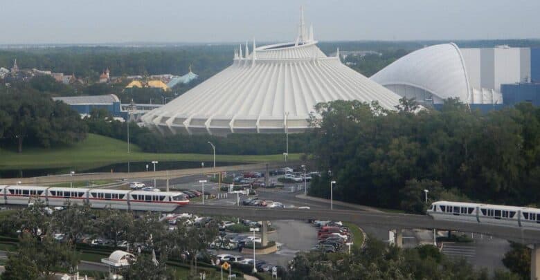 A monorail glides past Space Mountain at Magic Kingdom, a scene of stolen property in a themed play.