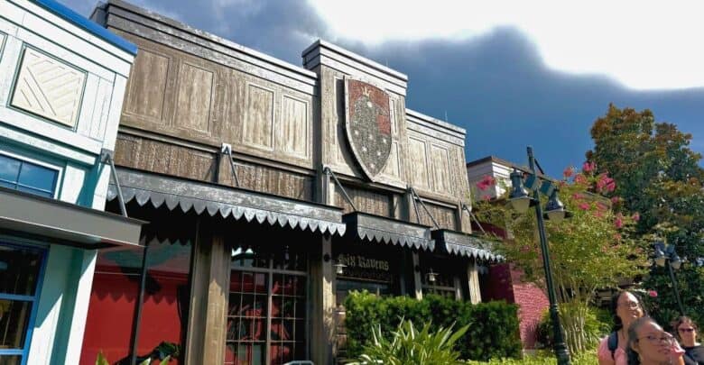 The Six Ravens shop exterior at Fantasy Faire in Disneyland, reminiscent of a pin trading event at Disney Springs.