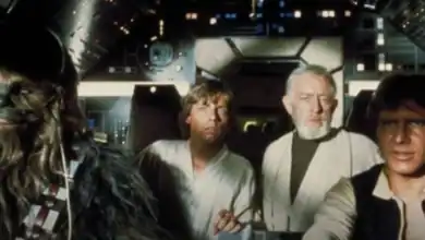 Chewbacca, Luke Skywalker, Obi-Wan Kenobi, and Han Solo in the Millennium Falcon cockpit at Star Wars: Galaxy’s Edge.