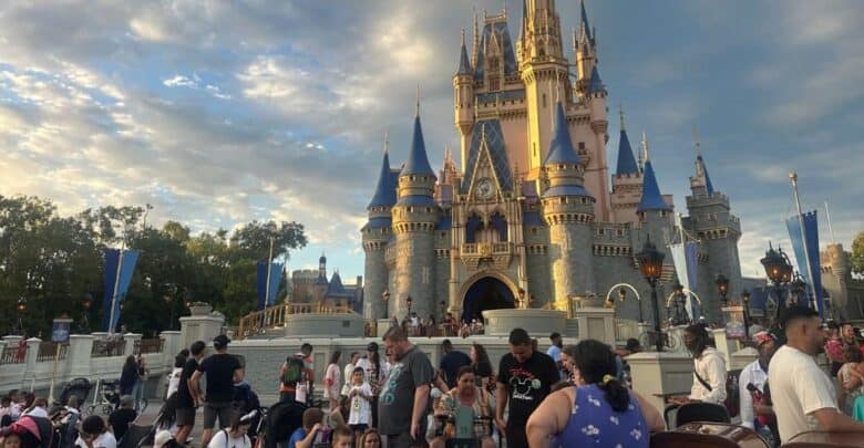 Cinderella Castle at Magic Kingdom during a busy holiday weekend.