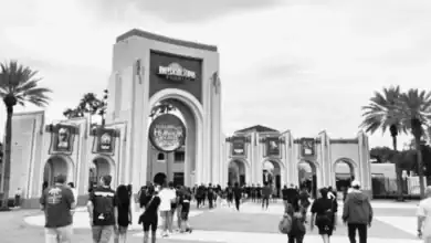 Halloween Horror Nights sign at the Universal Orlando entrance arch.